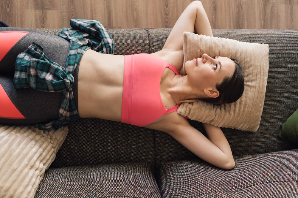 Pretty woman resting relaxed on the sofa